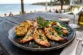 CUCINA AUSTRALIANA: Sydney Rock Oysters - King Prawns alla Griglia