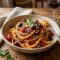 BUCATINI CON CAPPERI E OLIVE